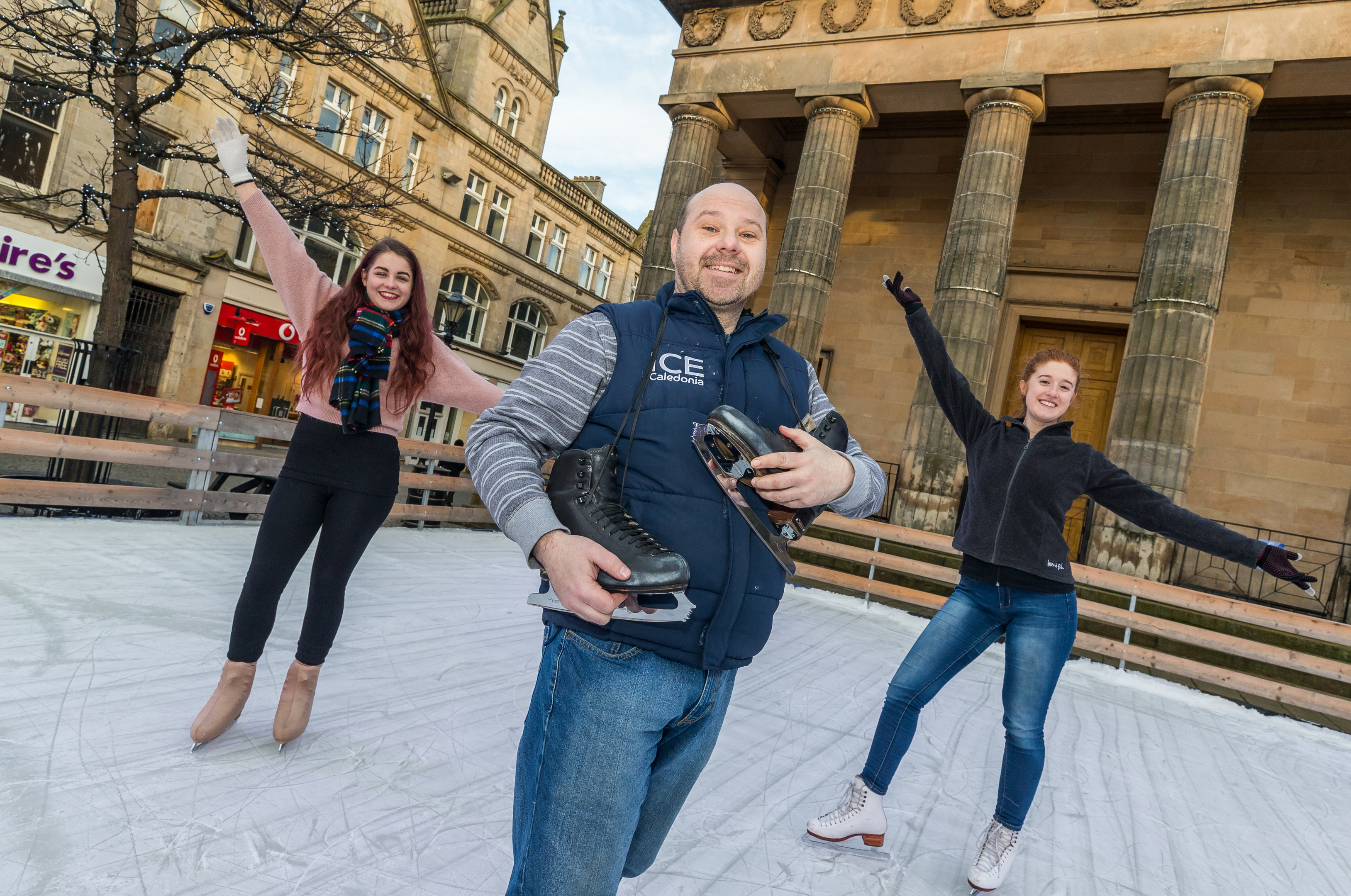 Front Jon Behari and rear L/R - Kerri Stuart and Amber Kenny on the Ice in the High Street outside St Giles, Elgin