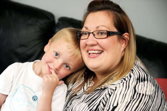 Kelly Hale, pictured right, with her son Mason.