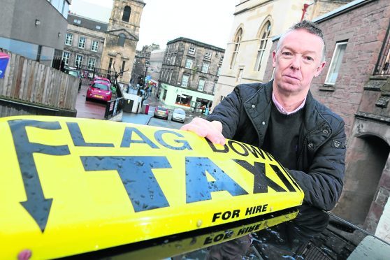 Inverness taxi driver David Coutts at the Castle Wynd rank.