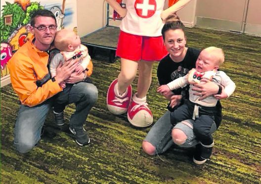 Steven and Elaine Watt with their twins Miller and Mayson.