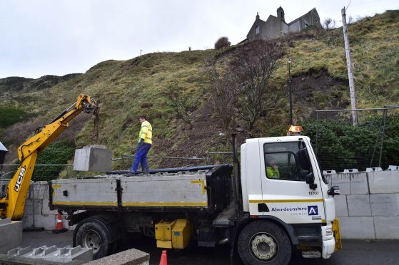 Efforts were underway to bolster the roadside yesterday.