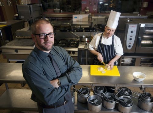 Alistair Fowlie, pictured left, assistant director of hospitality at Moray College UHI, has helped to set up an initiative to tackle the lack of staff in the sector. Also pictured: lecturer Craig Wilson.