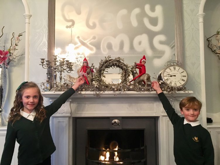 Caitlin and Myles Cooper with their festive elves