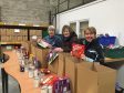 (L-R) Foodbank volunteers Marbeth Ritchie, Marty Donaldson and North Aberdeenshire Food Bank manager Jeannie Price pack up Christmas hampers.