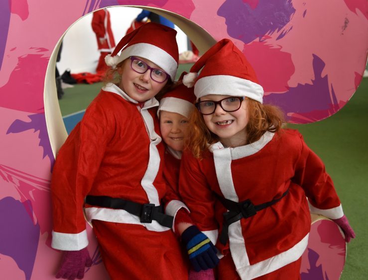 Aberdeen Santa Run: In the picture are from left: Sarah Mitchell, Maeve Mitchell and Hannah Mitchell. 
Picture by Jim Irvine  10-12-17
