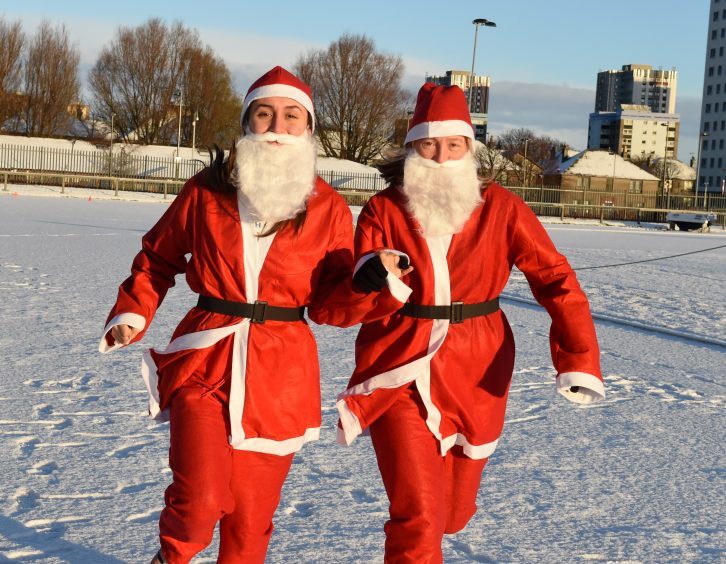 Aberdeen Santa Run: In the picture are Rachel Watson and Ruth Watson. 
Picture by Jim Irvine