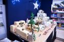 A giant nativity scene christmas cake, comprising amongst other things, 90 kg of icing, 4 litres of whisky and 14 lbs of dried fruit. Housed in Youlgrave village shop, in Derbyshire.