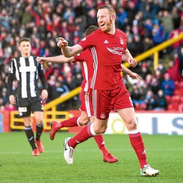 Adam Rooney has completed his move to Salford City.