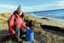 Marine biologist Lauren Smith, who also represents Aberdeen for Surfers Against Sewage, organises beach clean ups and is often helped by her spaniel Tattie.     
Picture by Kami Thomson