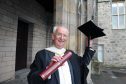 Alistair Macdonald picking up his honorary degree in 2015.