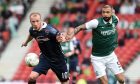 Hibernian's Liam Fontaine in action against ex-Ross County striker Liam Boyce in 2016