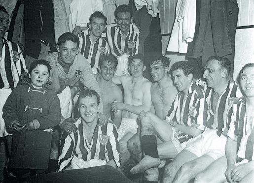 The jubilant Fraserburgh team in the dressing room after the match.