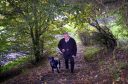 Former Grampian Country Food Group boss Mike Stephen with his dog, Angus 

Picture: Jim Irvine