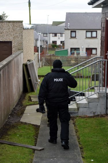 Police officers searching the West Road area of Fraserburgh.

Picture by Kenny Elrick