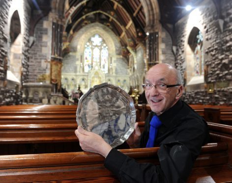 Former Presidet John MacLeod of Edinbuirgh and Lewis with the Doctor Alasdair Patrick Bardon Memorial Salver for Precenting a Psalm in St Andrew Church, Fort William.