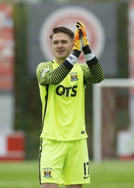 New Aberdeen signing Freddie Woodman, pictured in action for Kilmarnock last season, has the potential to be a Newcastle and England number one.