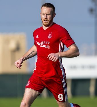 Adam Rooney left Aberdeen FC yesterday