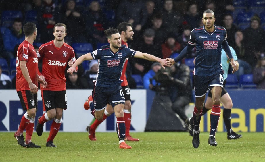 Ross County's David N'Gog (R) celebrates his goal to make it 2-1.