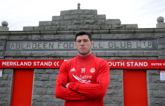 Scott McKenna suffered the injury against Rangers on Sunday.