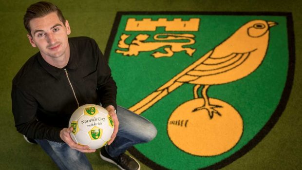 Kenny McLean has signed for Norwich.