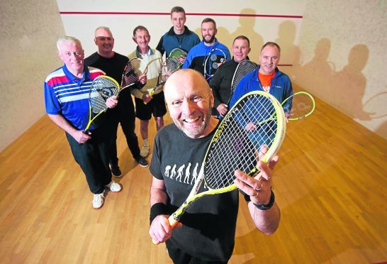 In photo at the front is John Ramsbottom with other members of the club.