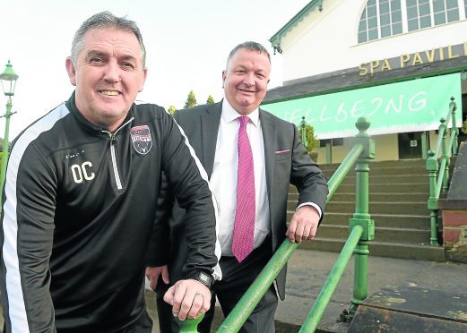 Owen Coyle, Manager of Ross County yesterday spoke at the Rural Wellbeing conference in Strathpeffer. Owen photographed with event Chairman Jim Hume.Pic by Sandy McCook