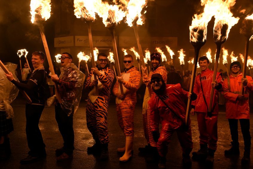 The 2018 torch parade followed by the burning of the galley.
