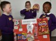 Heathryburn School launched Sugar Smart healthy living campaign. Pupils Cole Meldrum, 6 (left) and Honour Akinkunle, 5 with Laura Stefanska-Bacinski, 7