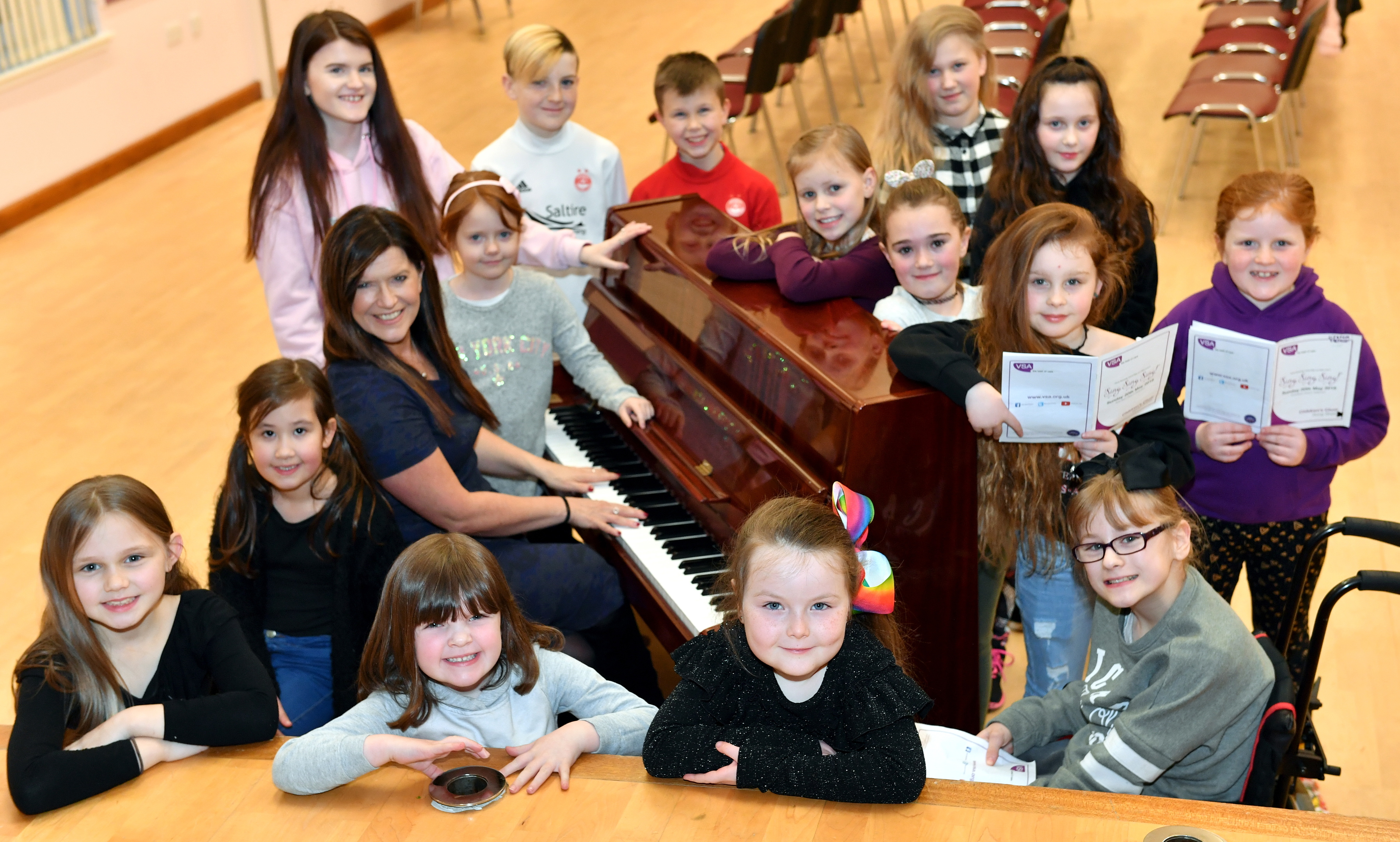 Preview for the VSA Sing Sing Sing, choral competition at the Beach Ballroom, Aberdeen, on 20th May.    
Pictured - Laura Pike at the piano with the Sing Sing Sing childrens choir for rehearsals.     
Picture by Kami Thomson.