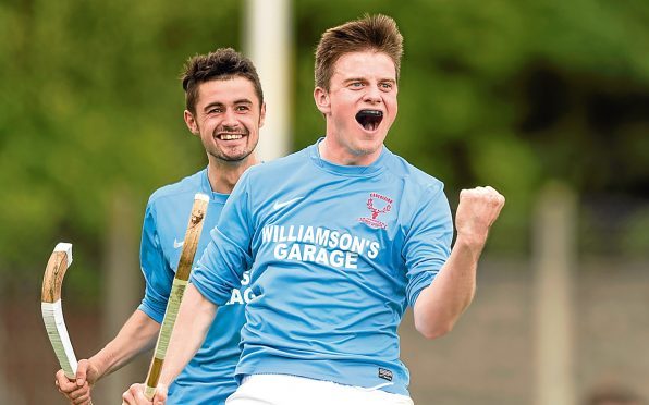Caberfeidh's Craig Morrison with the third goal of his hat trick.  Balliemore Cup Final, Caberfeidh v Fort William, played at Blairbeg, Drumnadrochit.