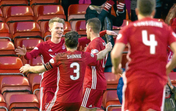 11/02/18 WILLIAM HILL SCOTTISH CUP 5TH RND 
 ABERDEEN v DUNDEE UNITED
 PITTODRIE - ABERDEEN 
 Aberdeen's Gary MacKay-Steven (11) celebrates his goal with team mates