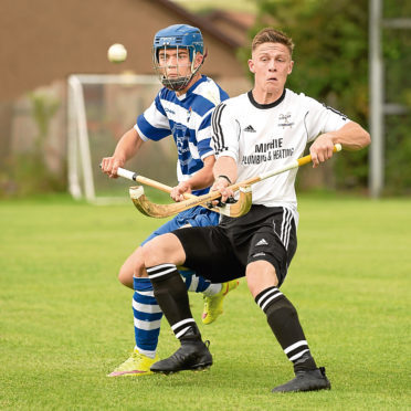 Craig Mainland (Lovat) and Iain Robinson (Newtonmore).  MacAulay Cup semi final (north), Newtonmore v Lovat, played at Braeview, Beauly.