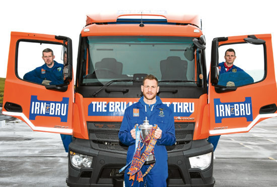 13/02/18 - 18021301 - STRIPE 
 A.G. BARR FACTORY - CUMBERNAULD 
 (L-R) TNS's Paul Harrison, Inverness CT's Gary Warren, and Dumbarton's Andy Dowie.