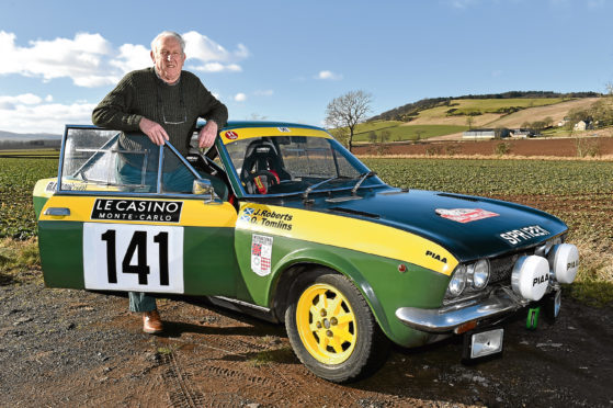 John Roberts with his two door Fiat 124 Coupe.
