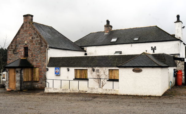 The windows are boarded up at the Midmar Inn, Midmar, near Echt.
Picture by Jim Irvine