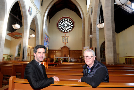 Pictured from left Father Keith Herrera cor priest at St Mary's and Robin Harding the parish manager inside the cathedral