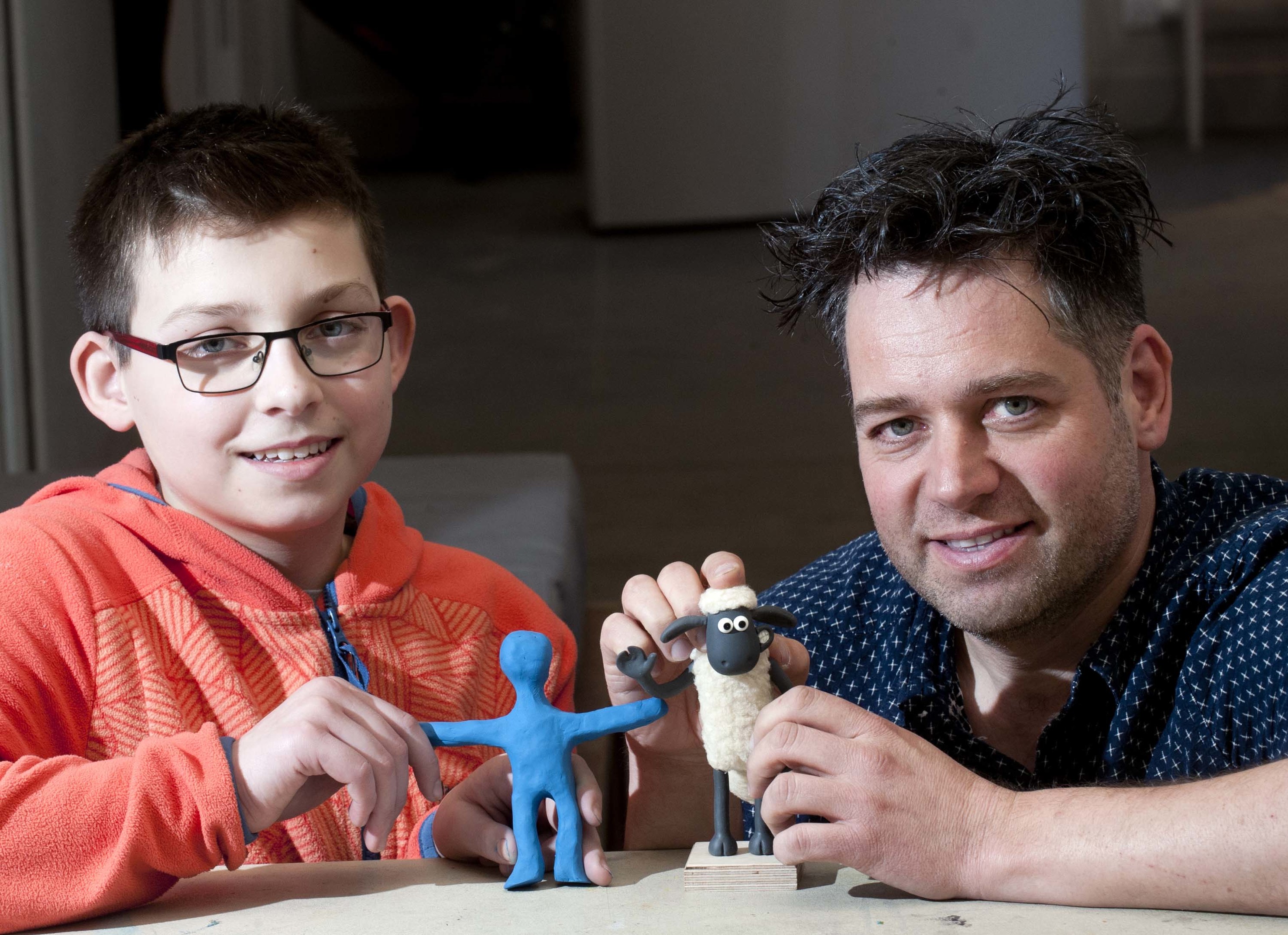 Aardman animator Andy Symanowski, pictured right, with Neo Hatch.