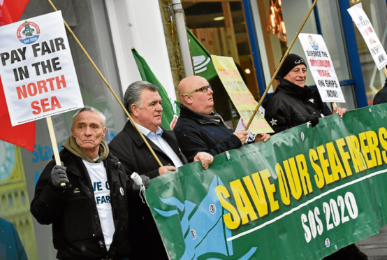 Seafarers chant 'port of shame' in pay protest