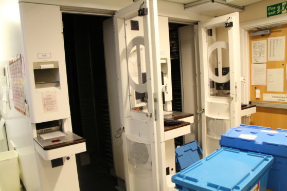 Two of the dispensing robots at Aberdeen Royal Infirmary, named Dee and Don.