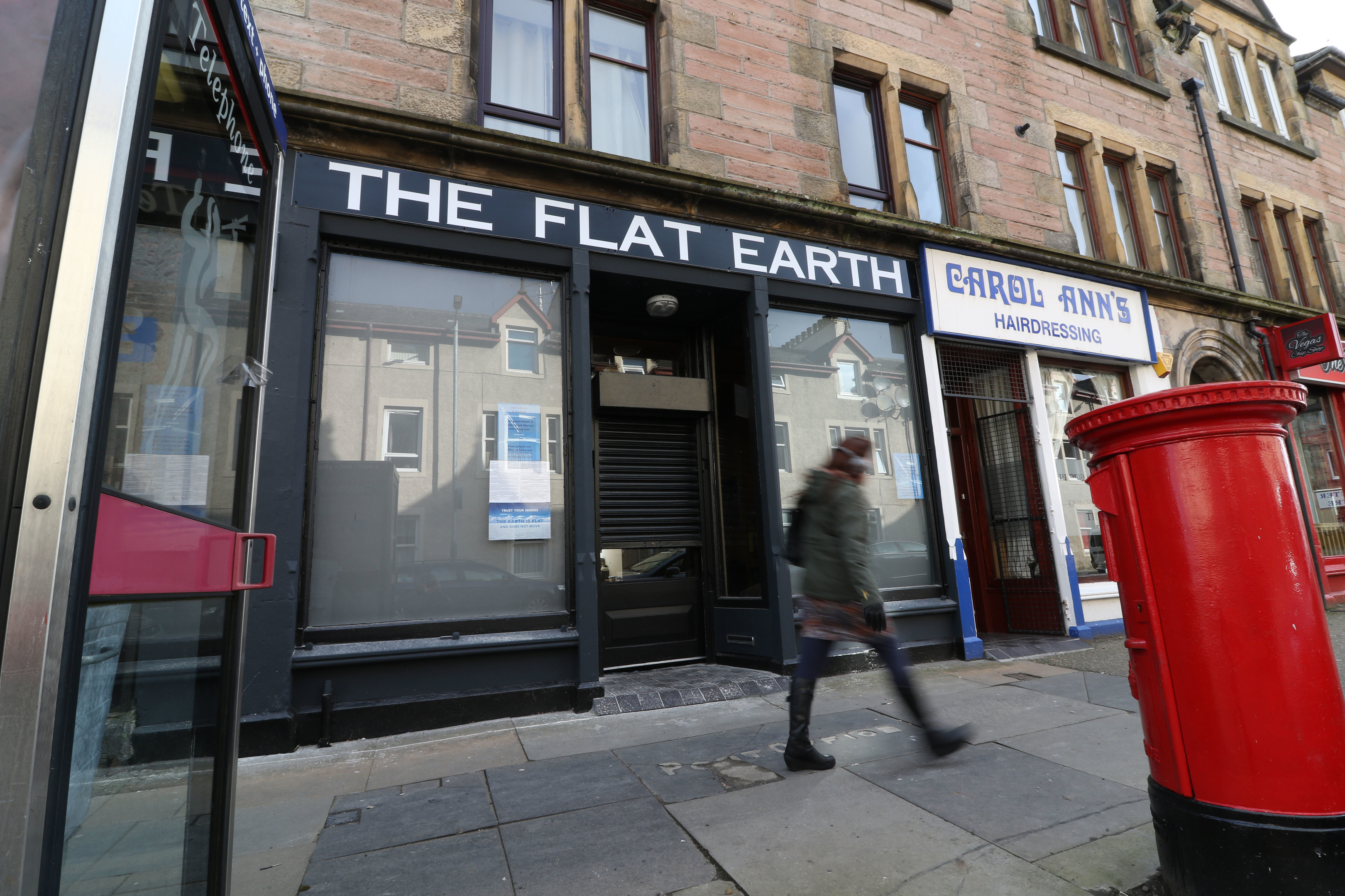 A shop called "The Flat Earth" has opened on Greig Street in Inverness, with posters in the window discussing the flat earth theory and the claimed threat from aircraft contrails.