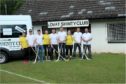 Lovat Shinty Club outside the old building.