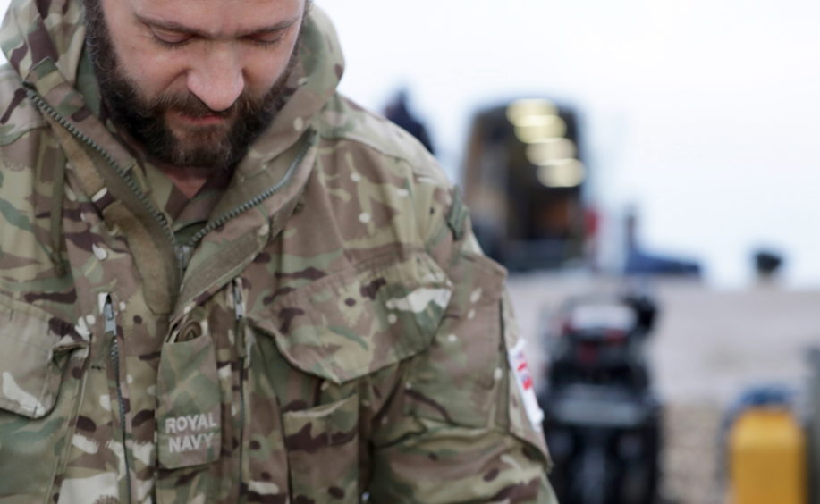 B Diver Andy Waller prepares the kit for deploying to the UXO