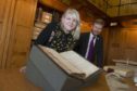 12/02/18 Nu-Art artist CARRIE REICHARDT-visietd aberdeen City Archives  to work on her art for nu-Art carrie with Councillor Ross Grant-