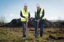 John Cowe (Right) Chairman of Moray Economic Partnership and Royce Clark (Left) MD of Grampian Furnishures Ltd
at their new site next to the A96 in Elgin. Picture by Jason Hedges