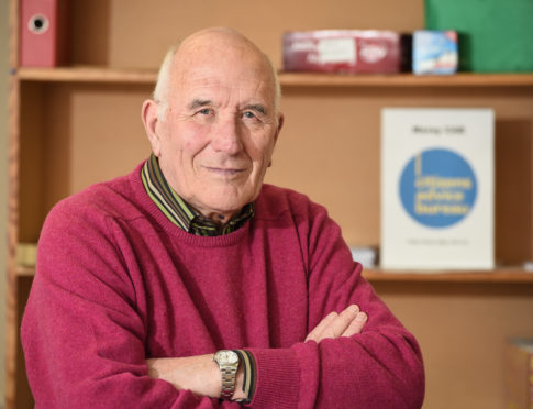 Mr Eddie Coutts, Chairman of Citizens Advice Bureau, Elgin, Moray inside the CAB offices
