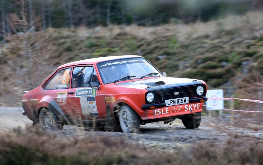 Duncan MacDonald and Neil Ross both of Portree in their Ford Escort.