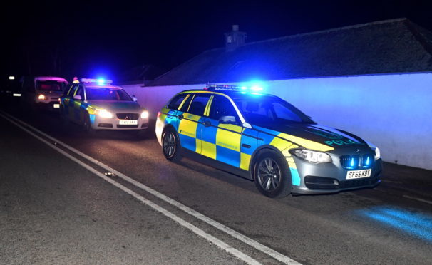 Police cars at the scene of the crash on the A93 between Ballater and Crathie.
Picture by Chris Sumner.