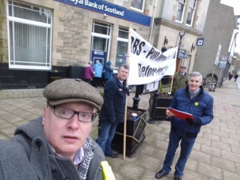 L-R: Banff and district councillor Glen Reynolds, RBS customer Stuart Bowden, Troup councillor Ross Cassie and Turriff and district councillor Alastair Forsyth