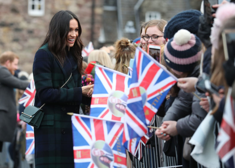 Meghan Markle meets well wishers during a walkabout on the esplanade at Edinburgh Castle