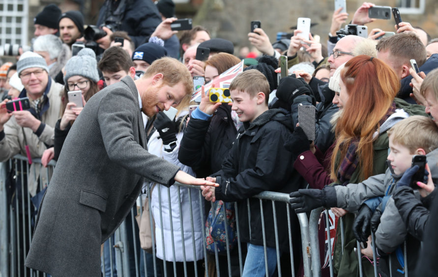Prince Harry during a walkabout on the esplanade at Edinburgh Castle